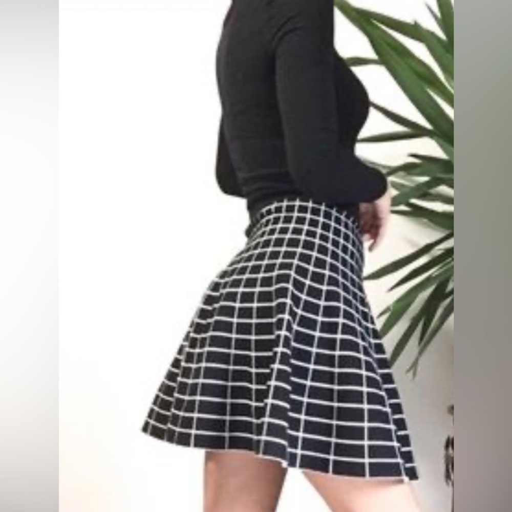Francesca’s Collection’s plaid skirt size small